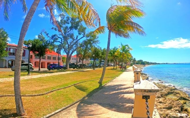 ocean dockside next to historic buildings and shops in st. croix us virgin islands