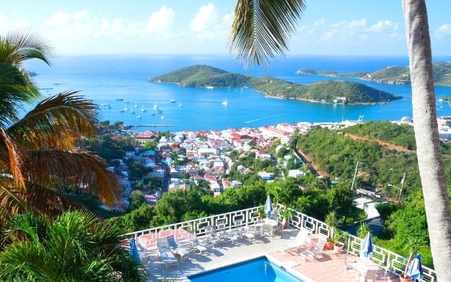 oceanview of st. thomas from luxury hotel with pool on mountain top