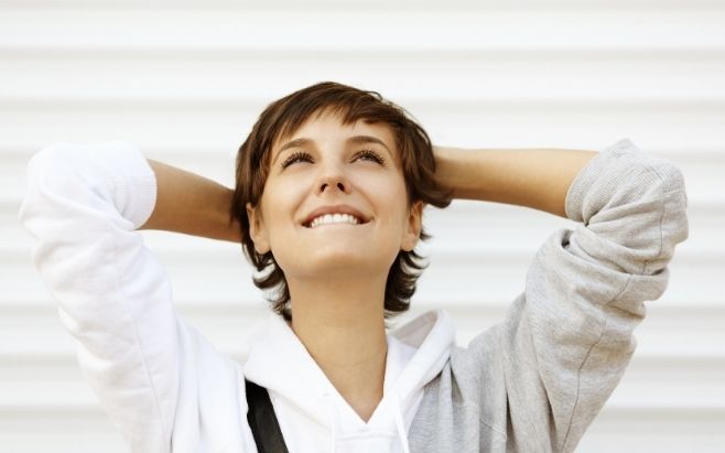 woman thinking positive smiling
