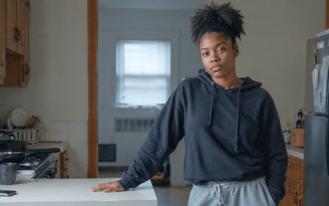 woman standing alone in the kitchen